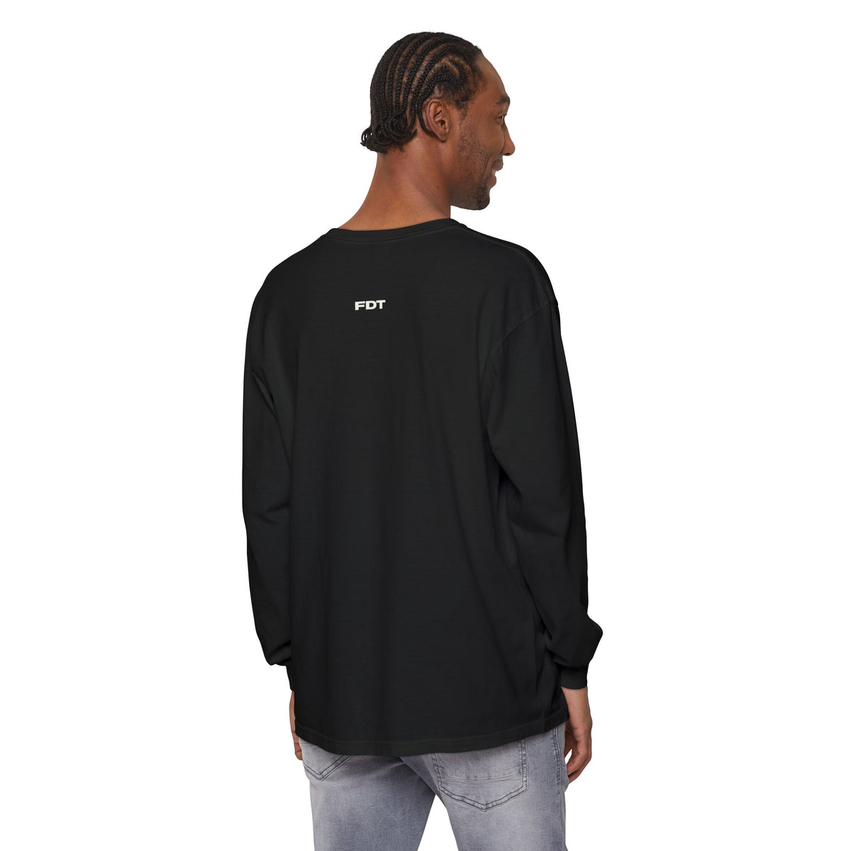 FDT Long Sleeve Tee in Black, back view on a person (supplier mockup)