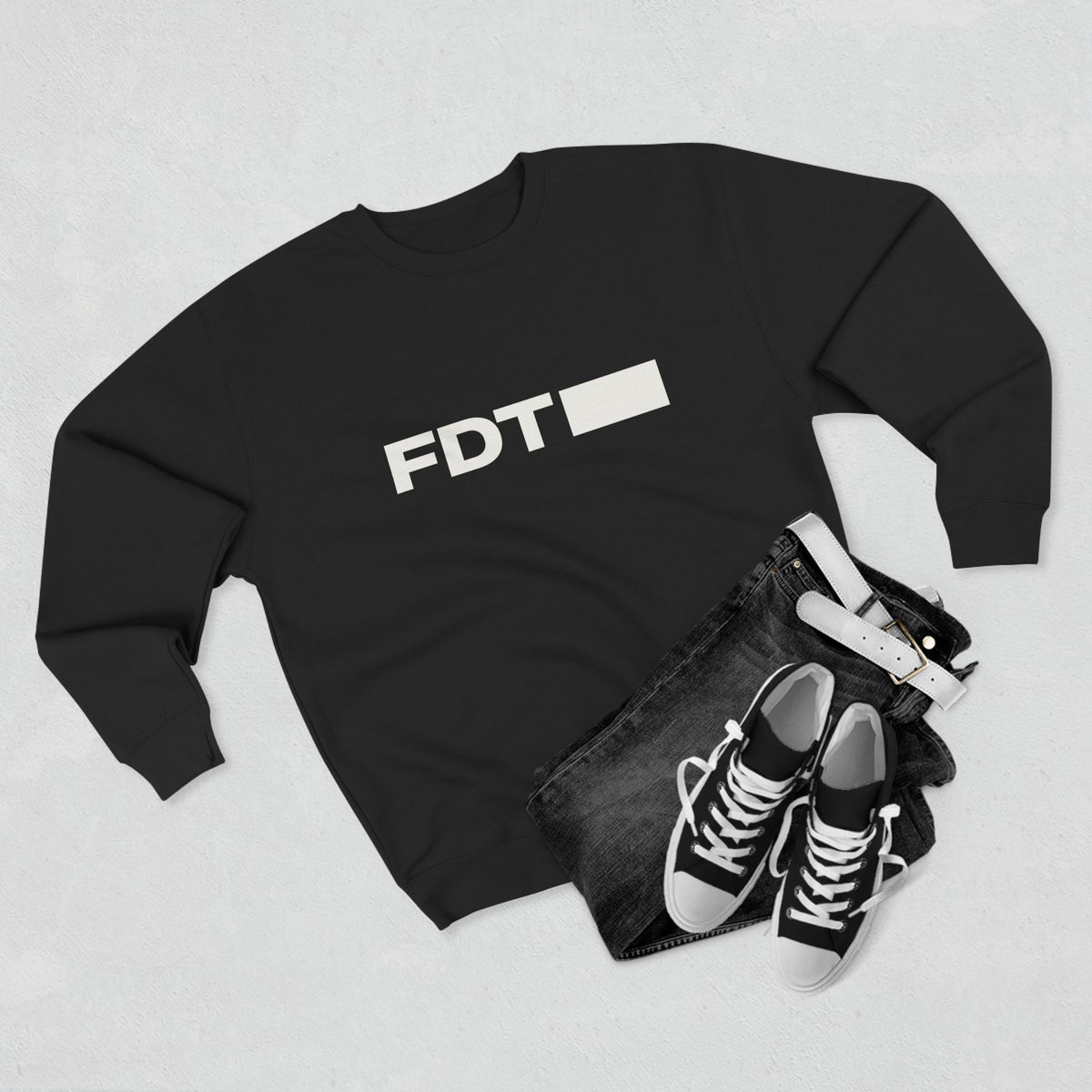 FDT Wordmark Crewneck in Black, flat lay view (supplier mockup)