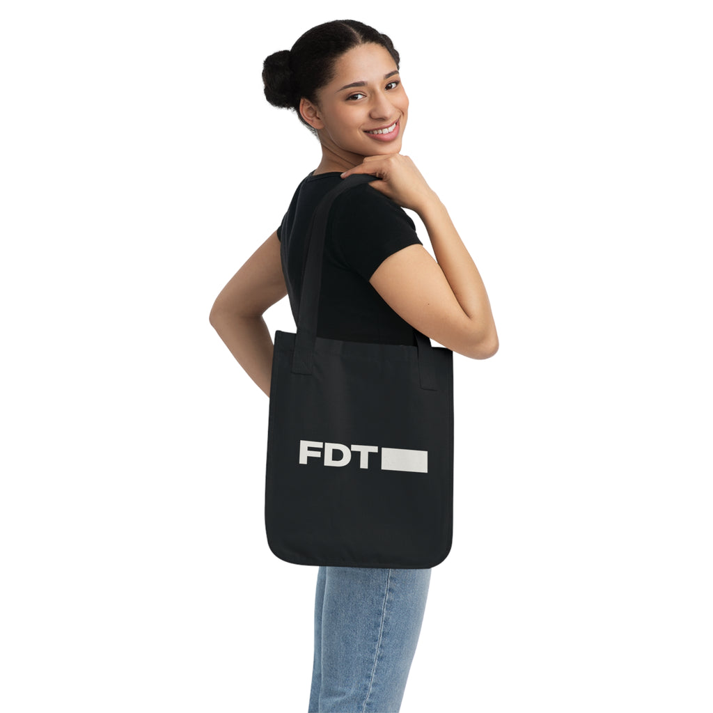 FDT Canvas Tote in Black, lifestyle view (supplier mockup)
