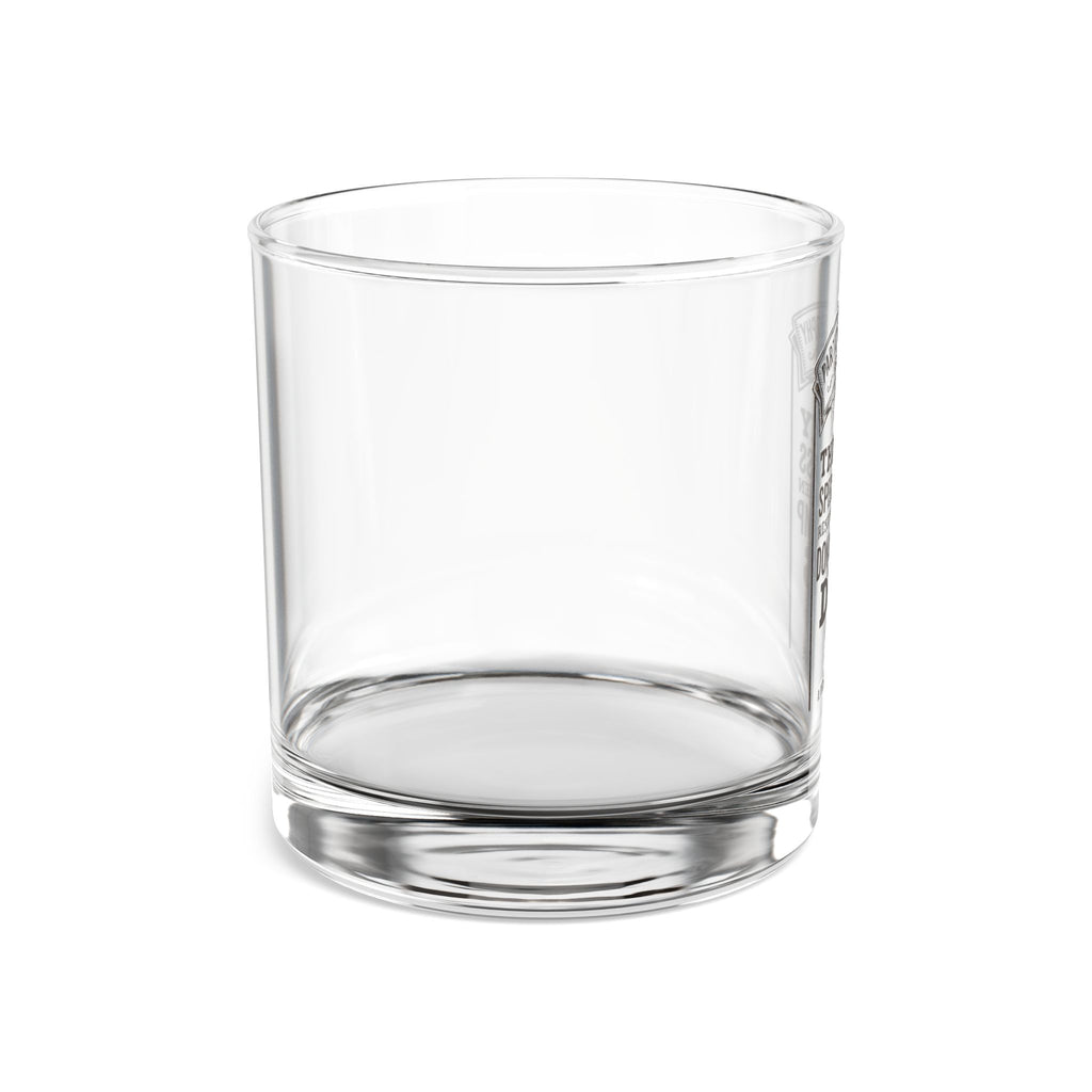 The “Conclusion” rocks glass — close-up of the printed artwork